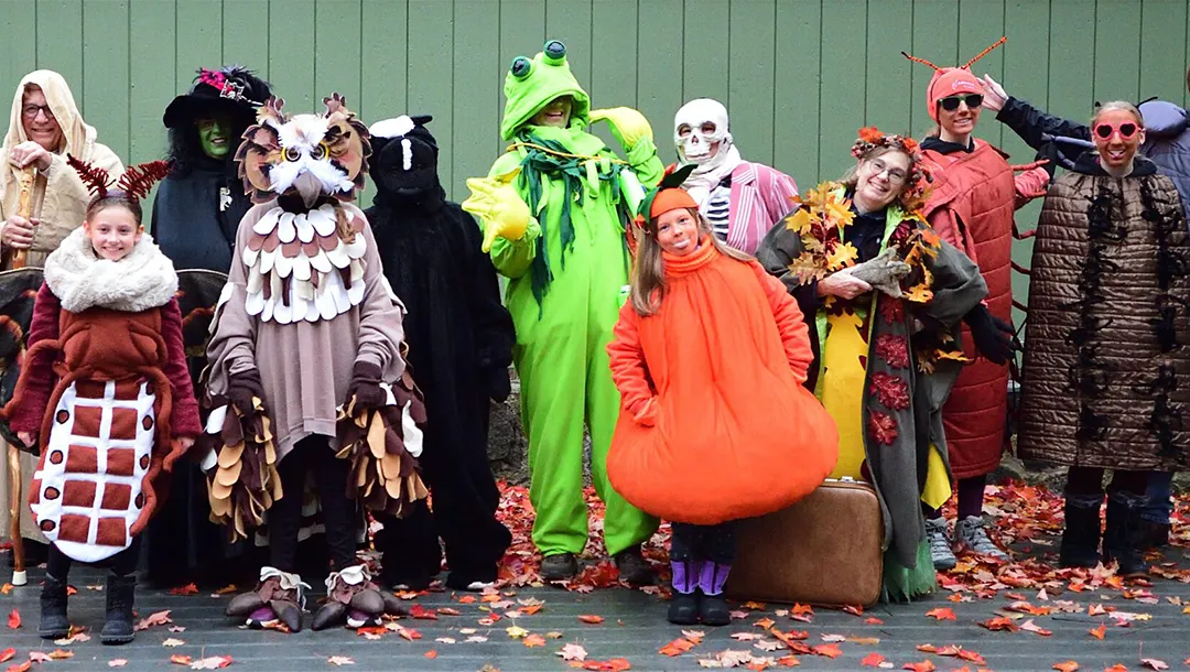 group posing with Halloween costumes